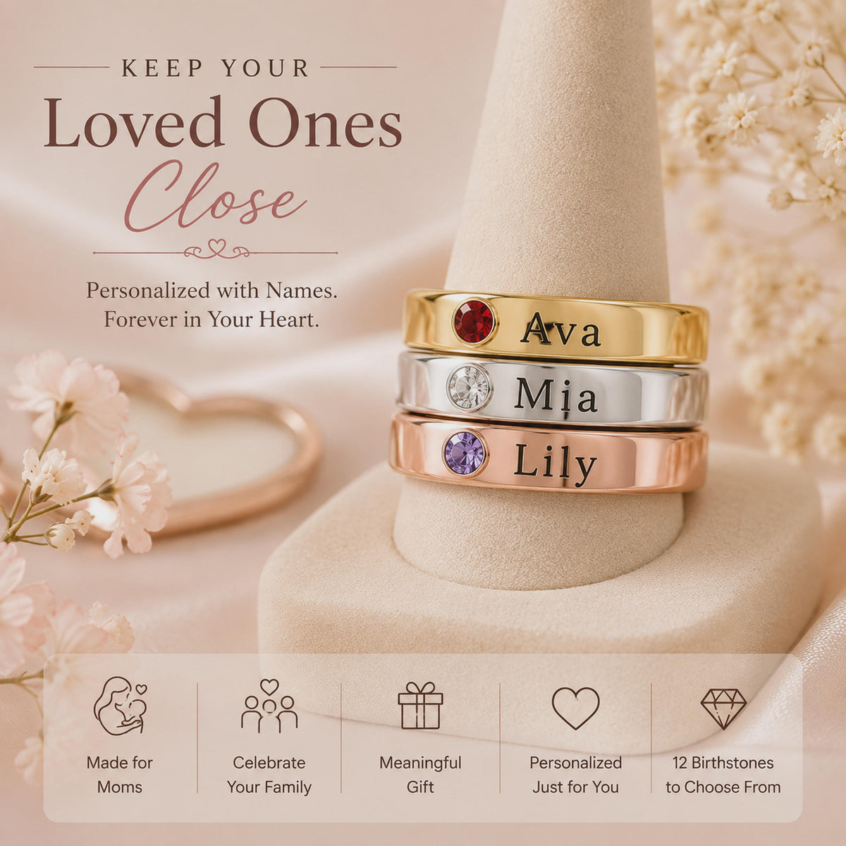 Stack of family birthstone name rings engraved Ava, Mia and Lily