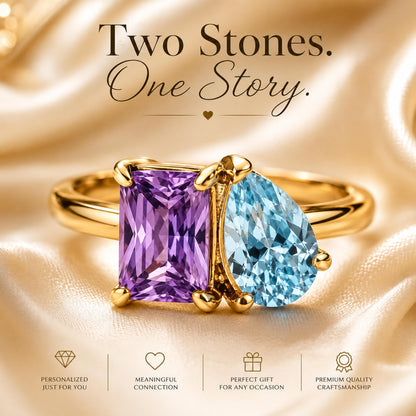Gold tone toi et moi ring with a purple rectangle stone and an aqua pear stone