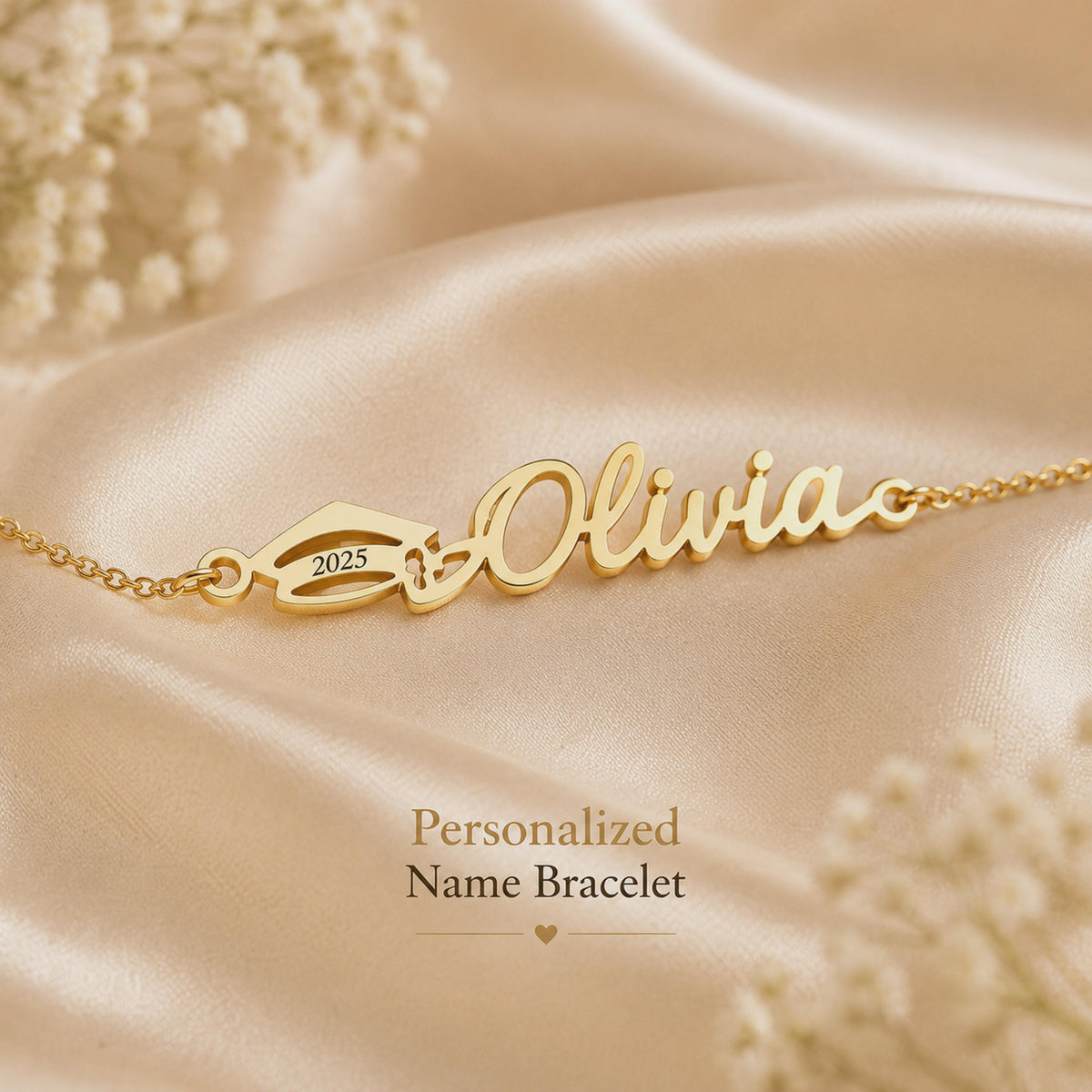 Gold tone Olivia name bracelet with a year plate on satin