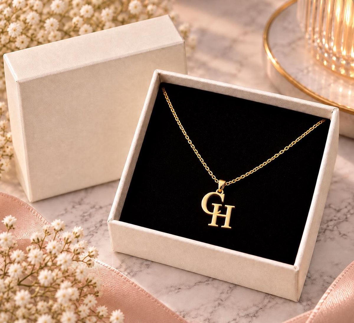 Gold tone double initial necklace in a gift box