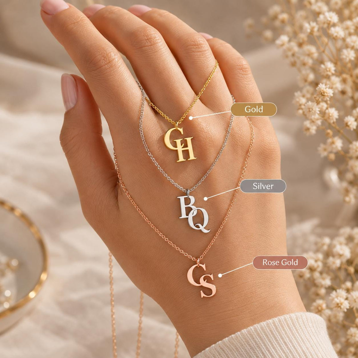 Double initial necklace shown in gold, silver and rose gold tone