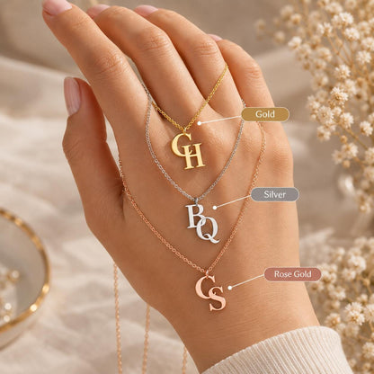 Double initial necklace shown in gold, silver and rose gold tone