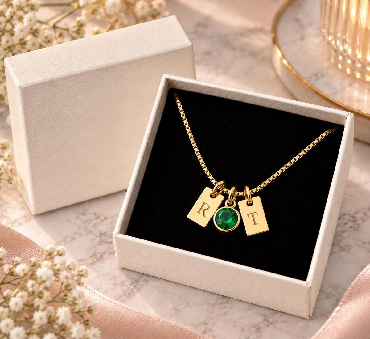 Gold tone initial tag necklace in a gift box