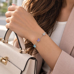 Butterfly birthstone bracelet with colored butterfly stones worn on the wrist