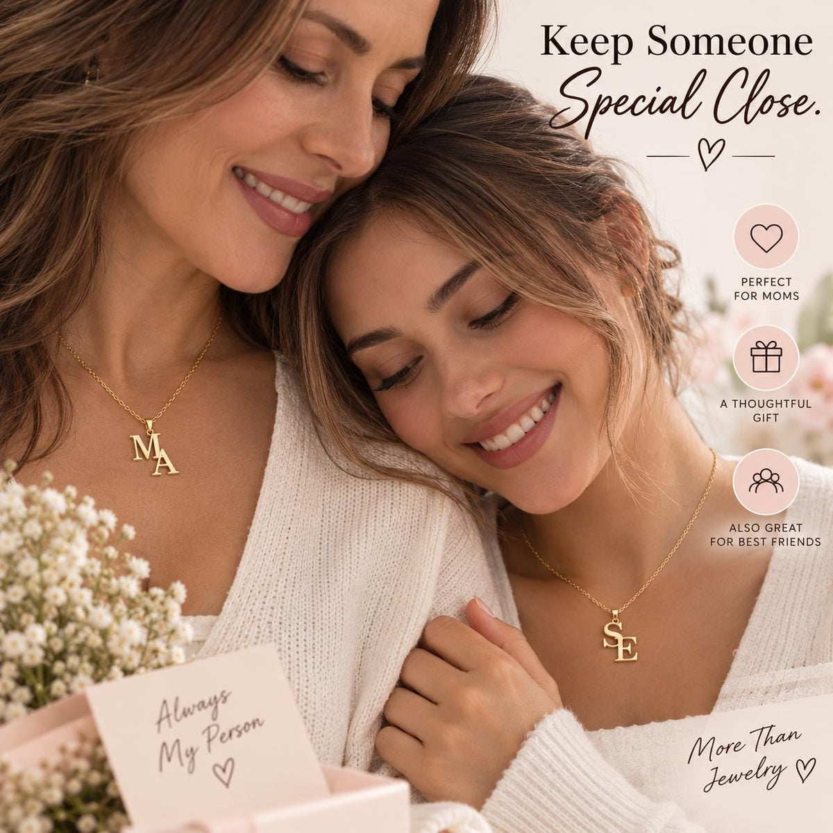 Two women wearing matching initial necklaces